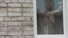 Naked Step mom washes window son spies on mommy. Naked in public. Spying